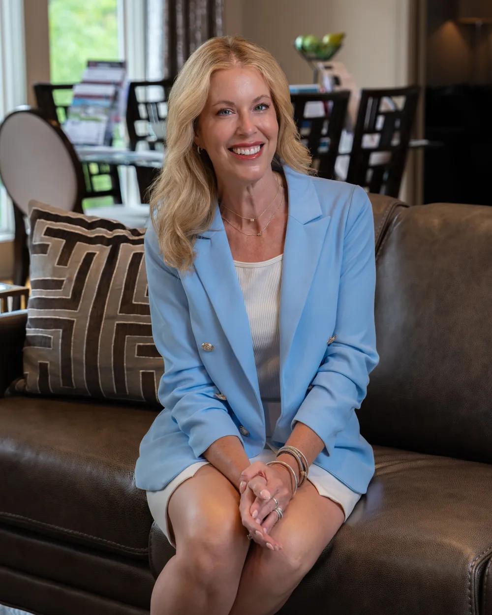 Cara Painter seated in a Kansas City living room