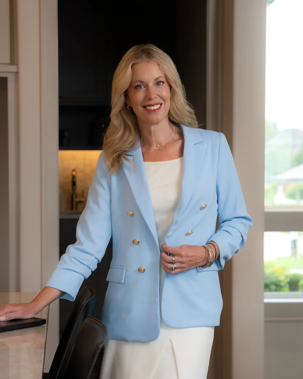 Cara Painter in the kitchen of a luxury Kansas City home